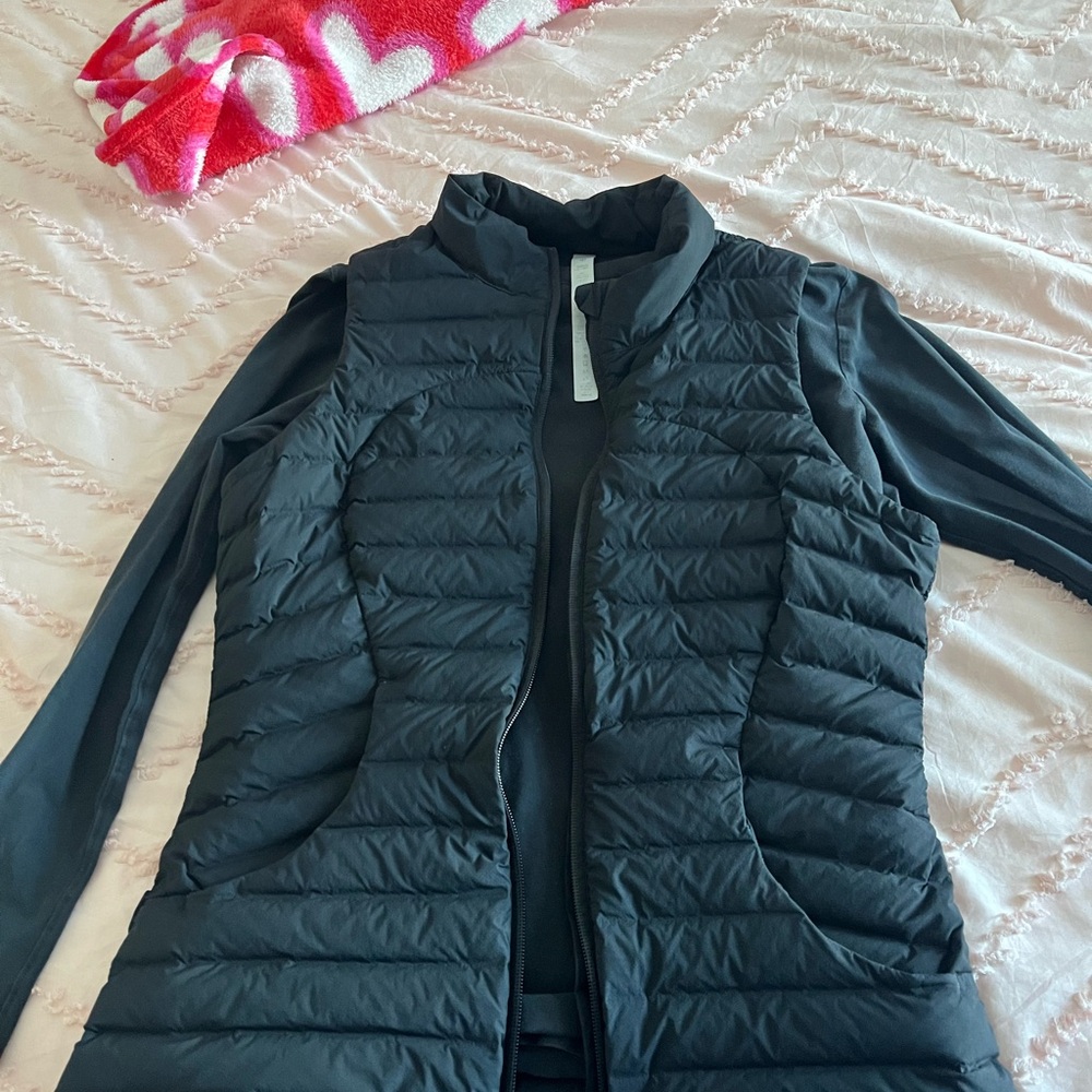 Women's Black Lululemon packet down vest comes with black lululemon undershirt